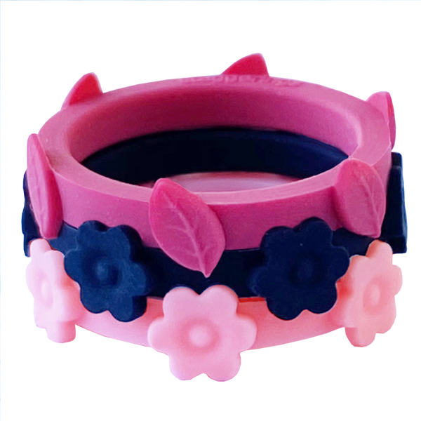 Cranberry Leaf with Midnight and Bubblegum flower rings that stack together. Flexible and comfortable silicone rings.